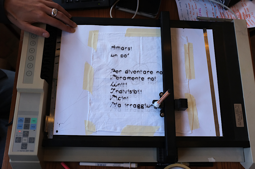 Poem plotted on very thin fabric