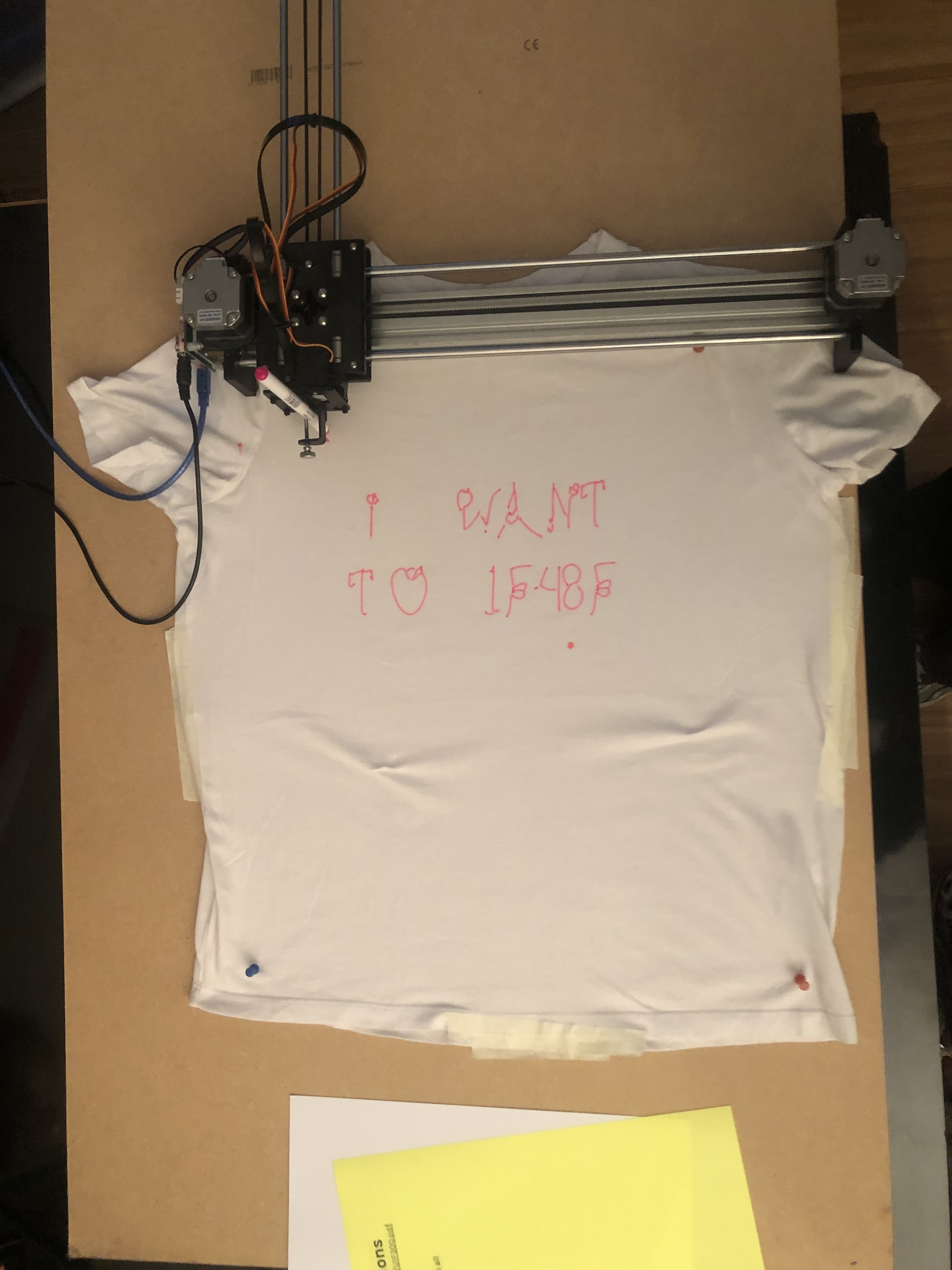 T-shirt with secret unicode message, plotted with an AxiDraw