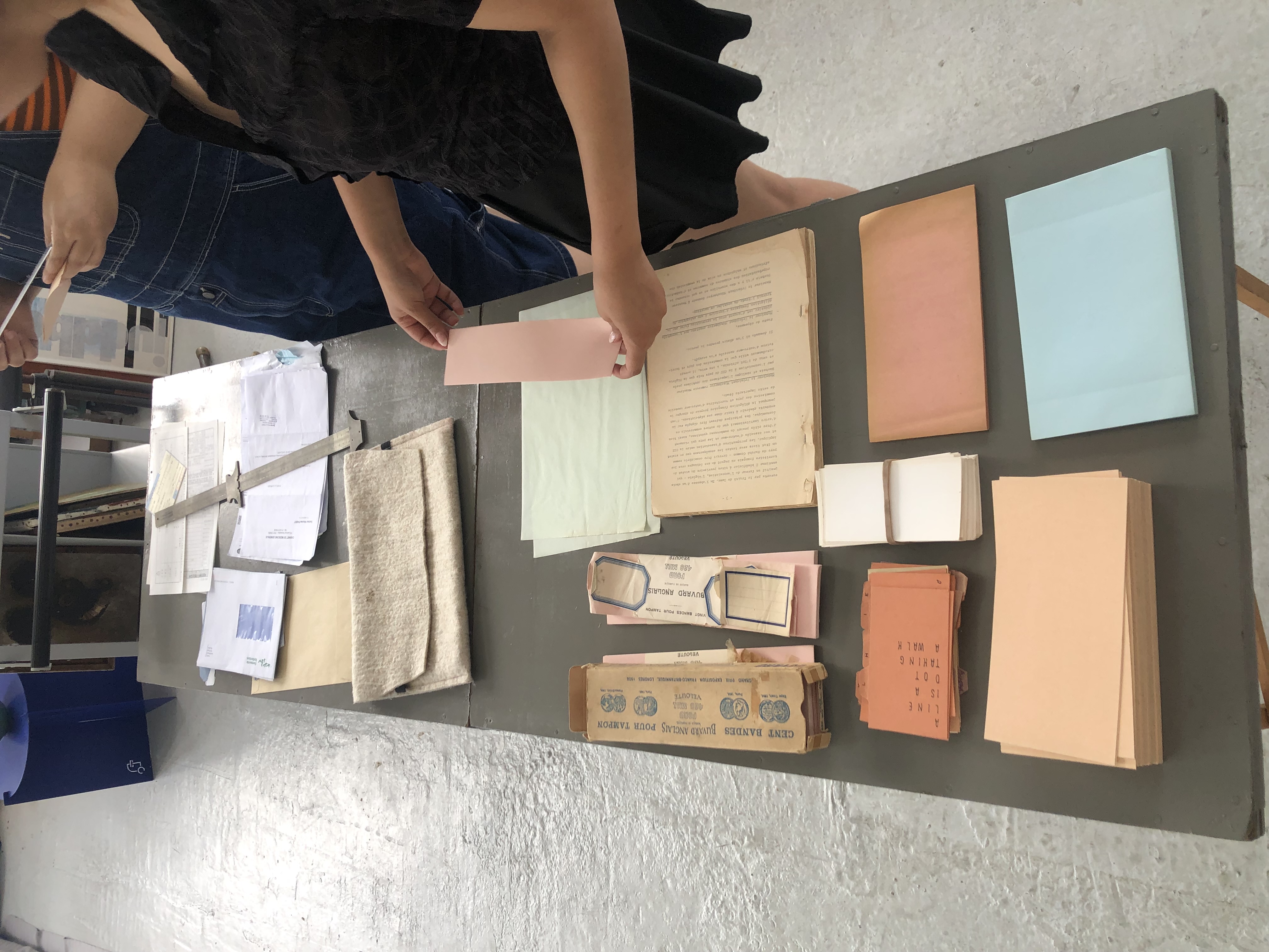 Different types of papers gathered from various places, including Jeu de Balle.