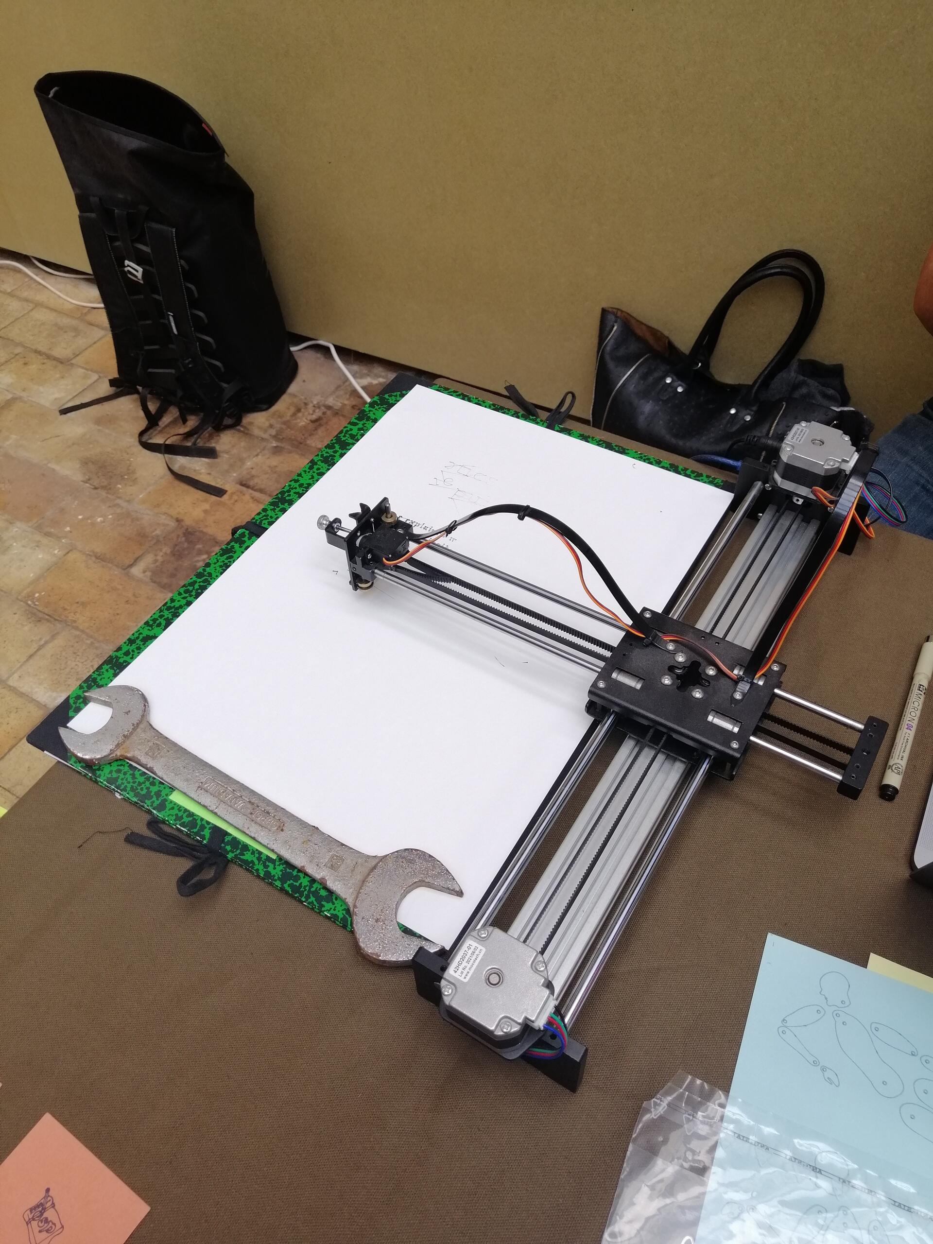 The AxiDraw plotter at the A line is a dot table